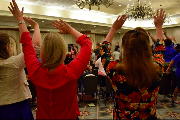 Attendees at TNOYS' 2015 annual conference dance along with closing keynote, drummer Nina Rodriguez